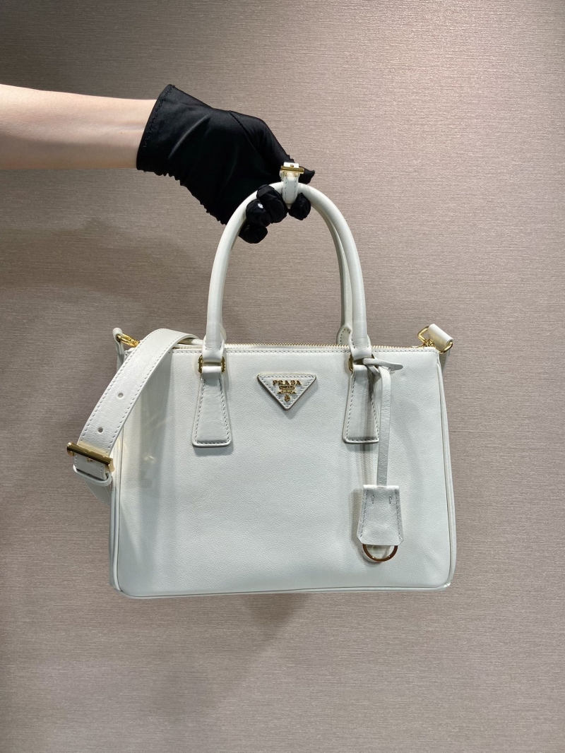 Pra*a top handle bags